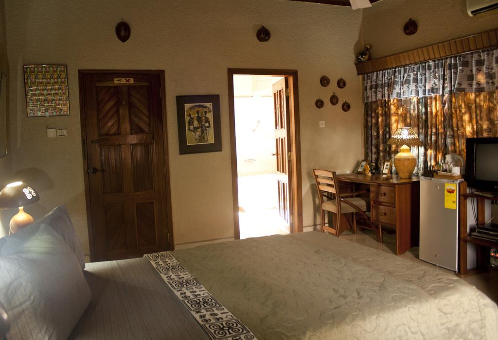 Four Villages Inn Кумаси Стая снимка