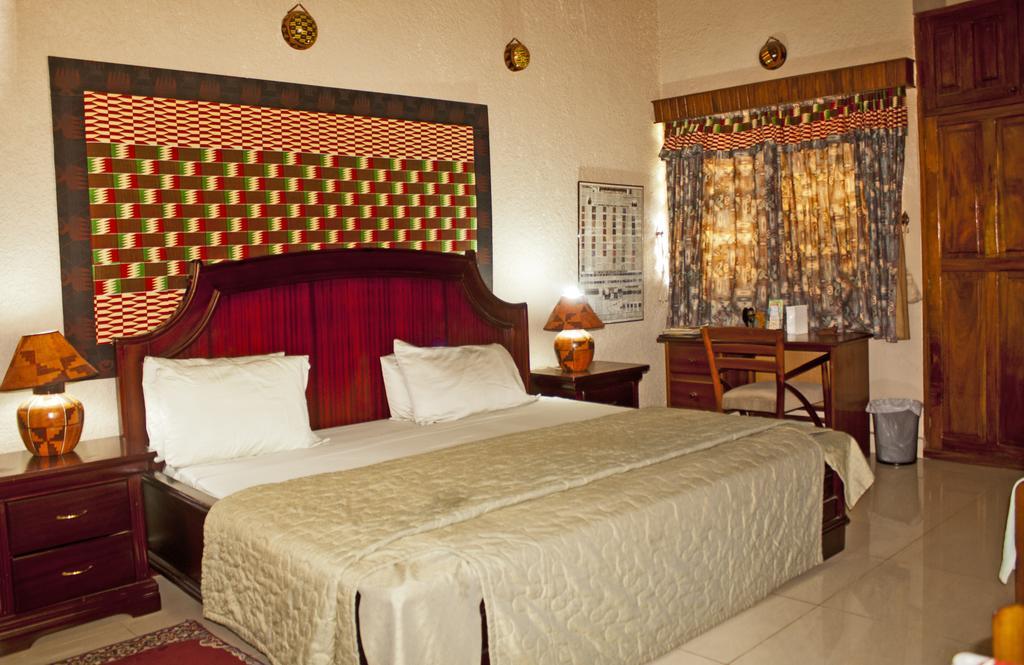 Four Villages Inn Кумаси Стая снимка