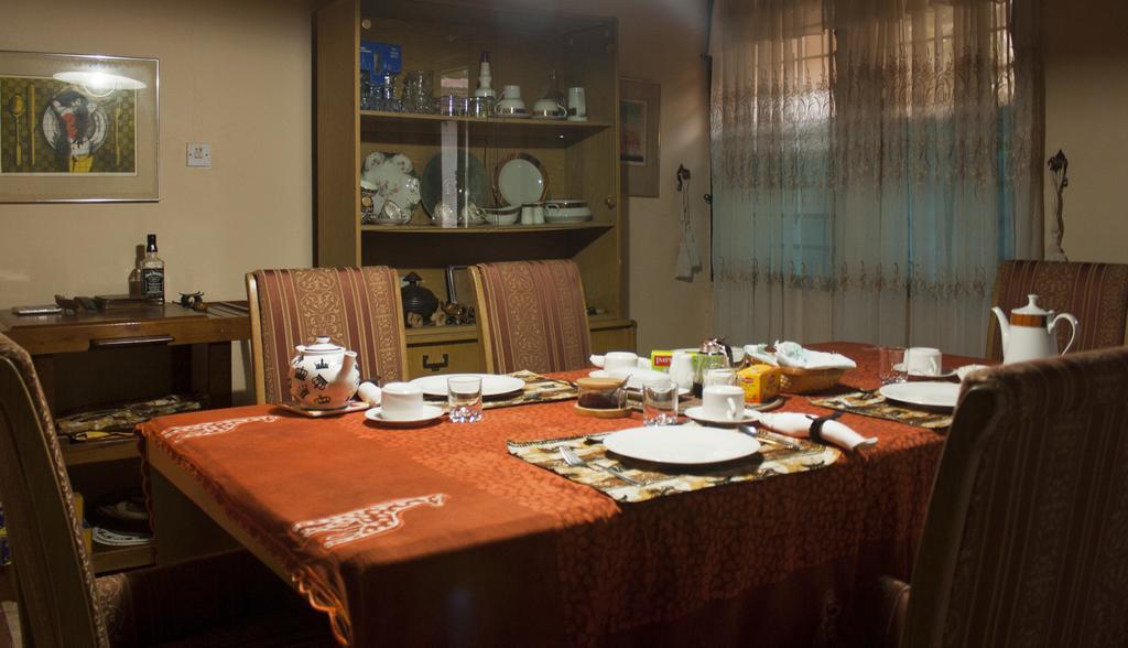 Four Villages Inn Кумаси Екстериор снимка